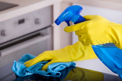 Professional oven cleaner in SE1 removing grease from a kitchen oven